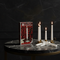 Candele su marmo scuro