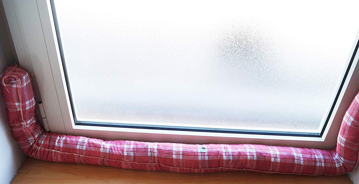 Fabric draft excluders for doors and windows